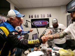 Crappie Dan shakes had with the host of ROCK-106 Radio Station, demonstrating the business side of professional fishing.