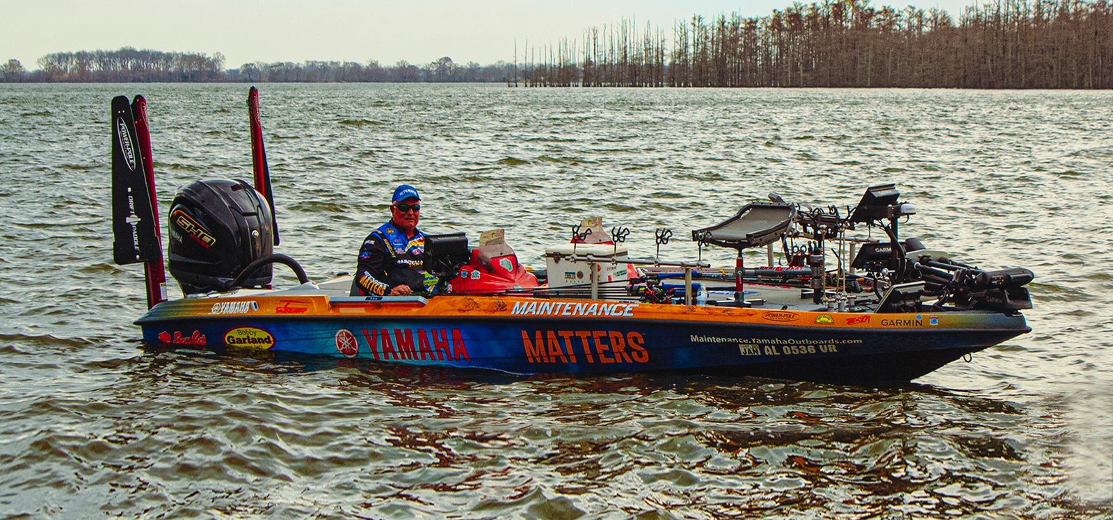 Crappie Dan fishing in a tournament from his Bass Cat Boat.